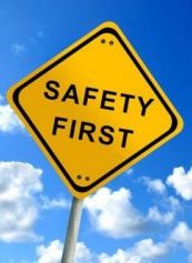 A yellow traffic sign that says safety first
